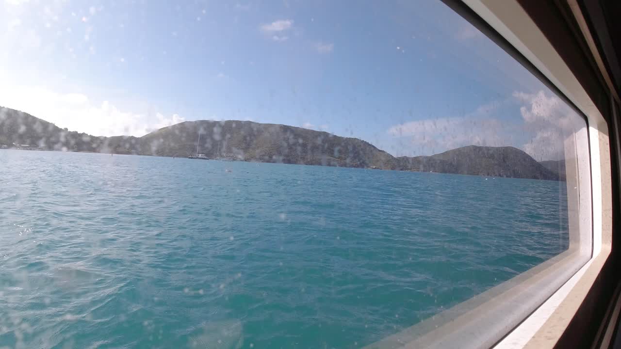 beautiful view of paradise in the British Virgin Islands. A view out of a large private yacht
