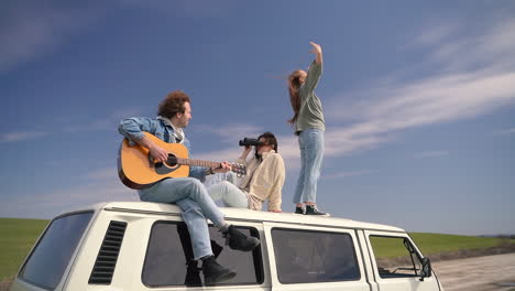 a group of teenagers in a caravan on a road lost in the middle of the countryside