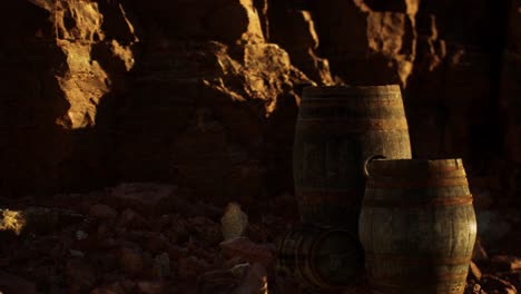 old-wooden-vintage-wine-barrels-near-stone-wall-in-canyon