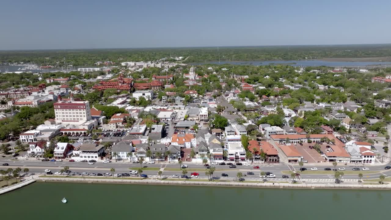 Downtown St. Augustine, Florida along the Matanzas River with drone video close up moving in a circle.