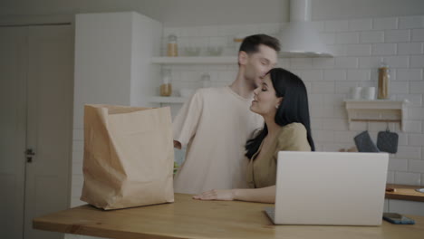 Couple Checking Groceries Order at Home