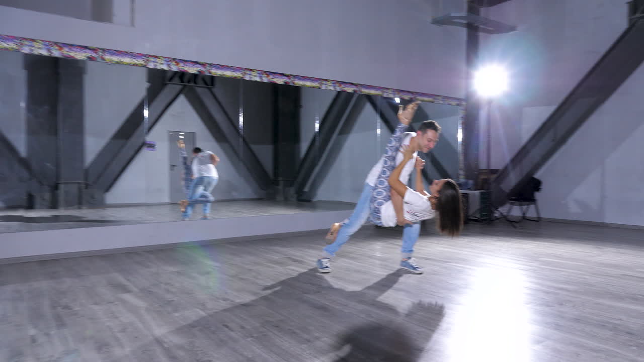 Dancing couple in a studio