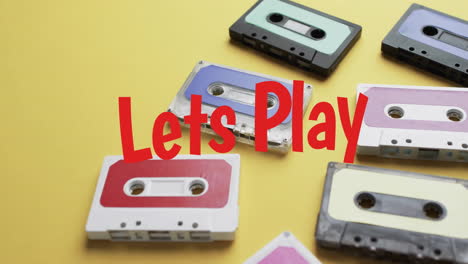 animation of lets play text over tape on yellow background