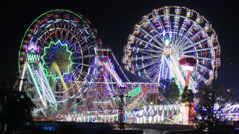 lighting ferris wheel in the night