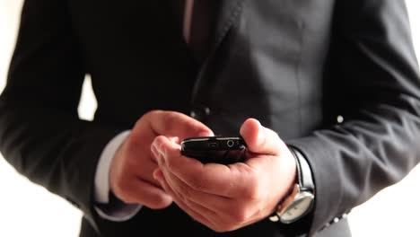 Businessman-Using-Smart-Phone