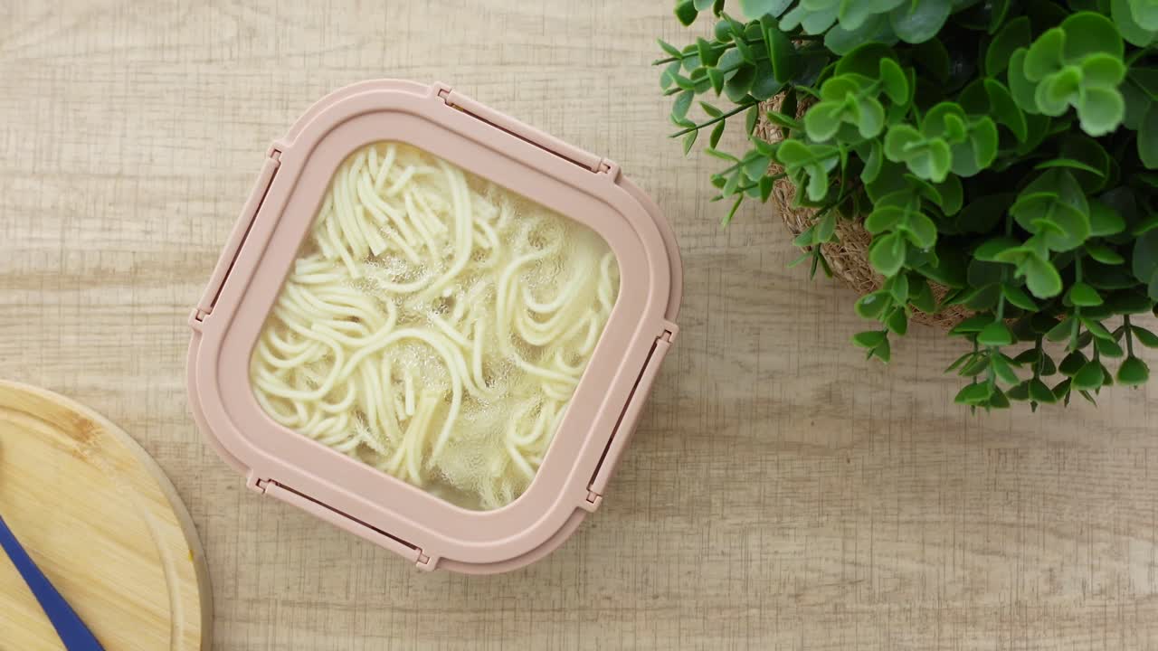 Spaghetti in a container
