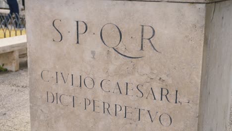 ancient roman monument with inscription