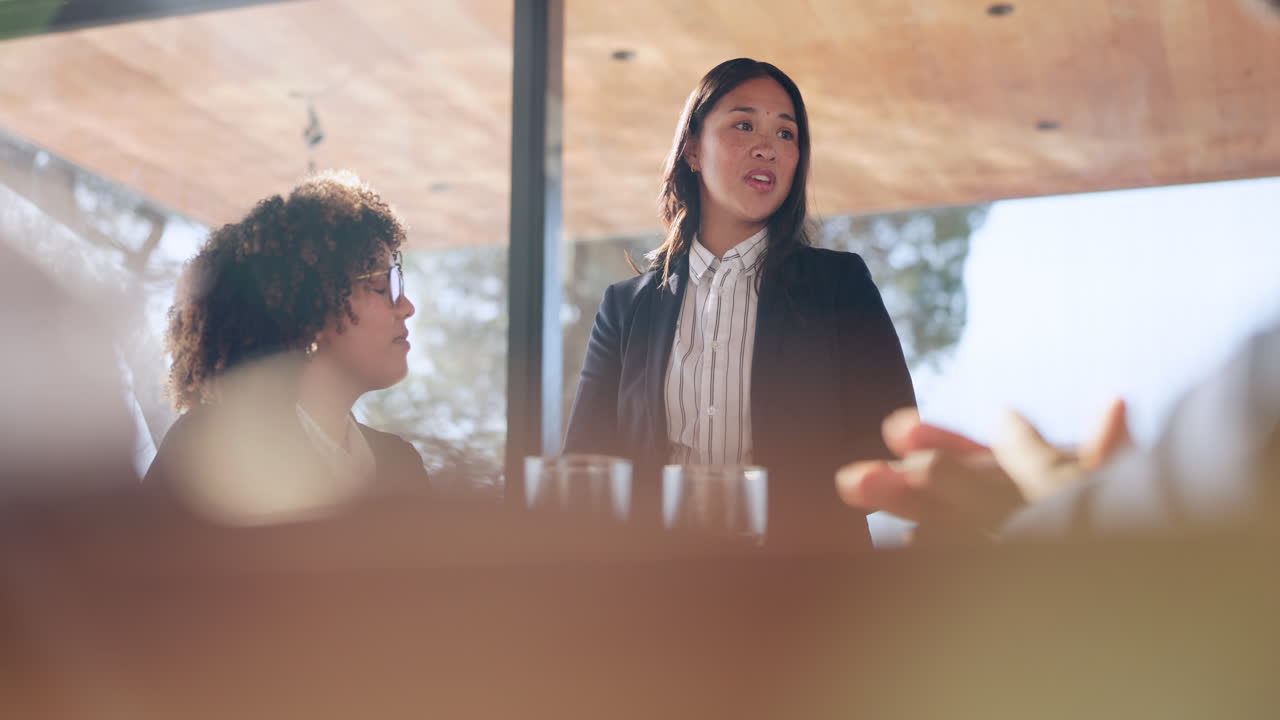 Tablet, woman and meeting with a business team