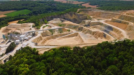 Aerial-View-Over-Lime-Plant-In-Opencast-Mining-Quarry---drone-shot