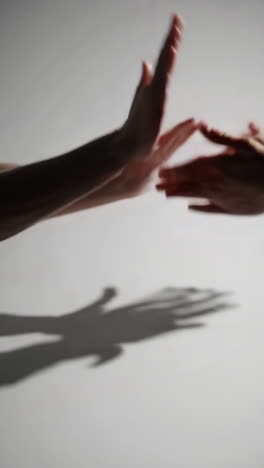 hands reaching together