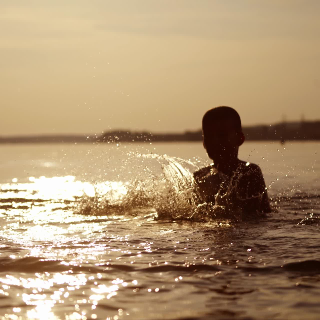 Kids playing in the river