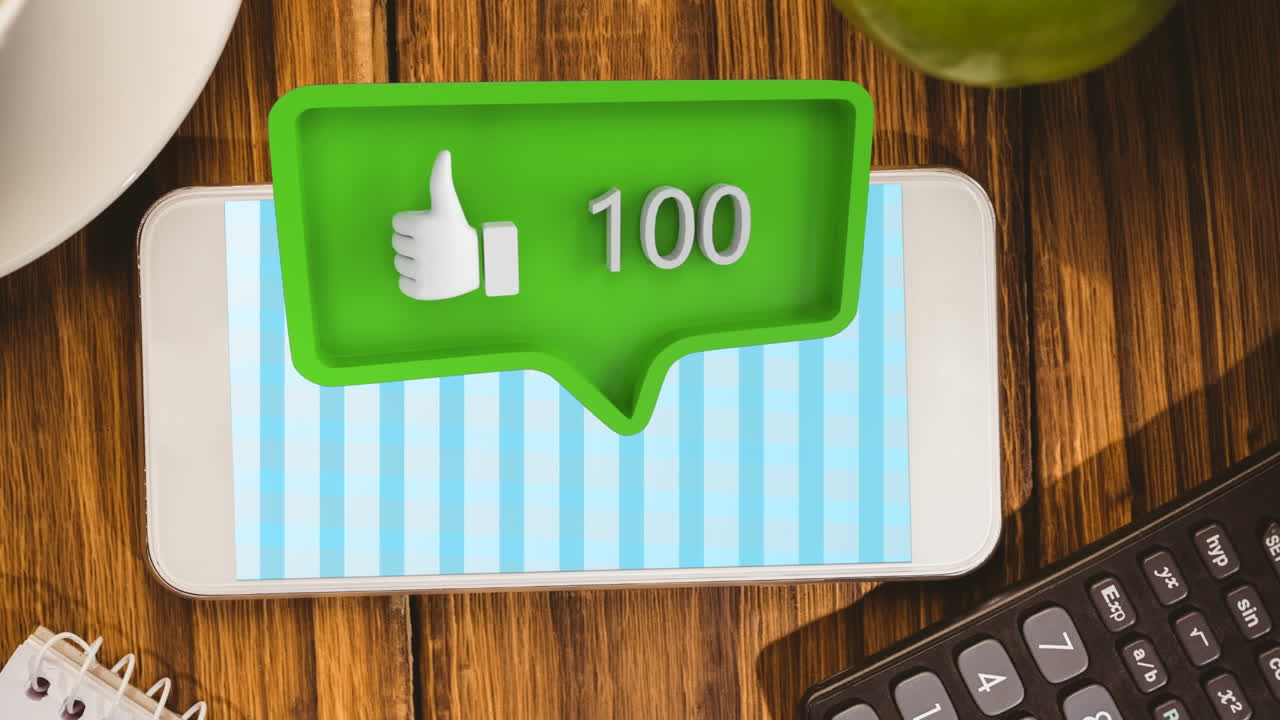 teléfono móvil en una mesa y un icono similar para las redes sociales