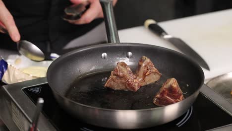 chef cooking lamb chops