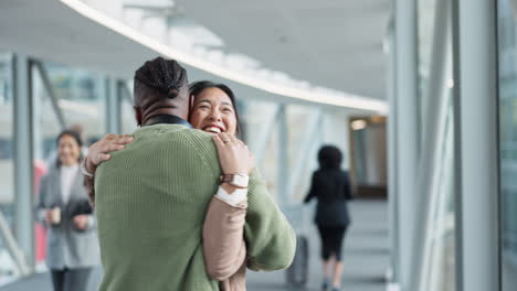 Hug,-excited-and-a-couple-at-the-airport