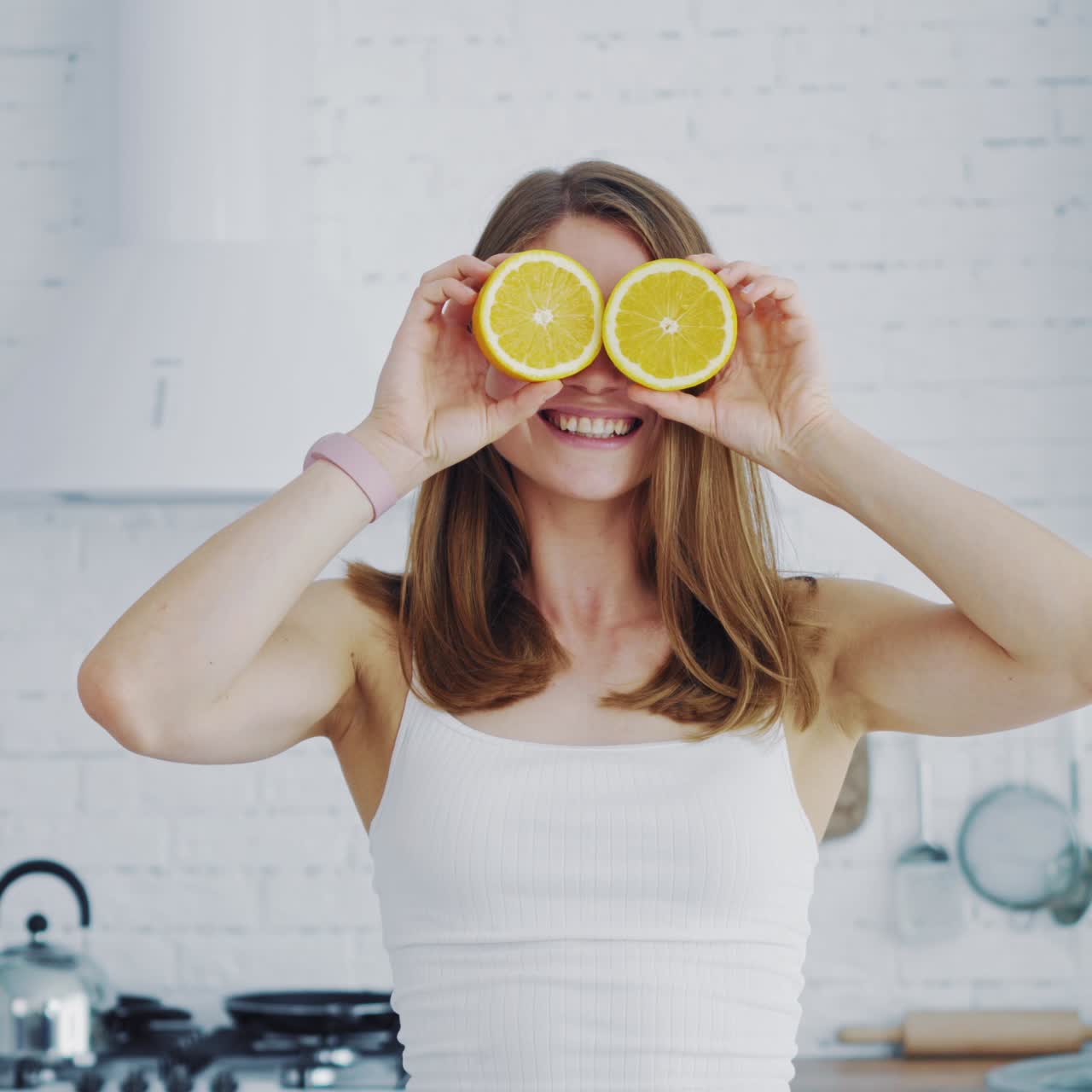 Happy woman with orange eyes