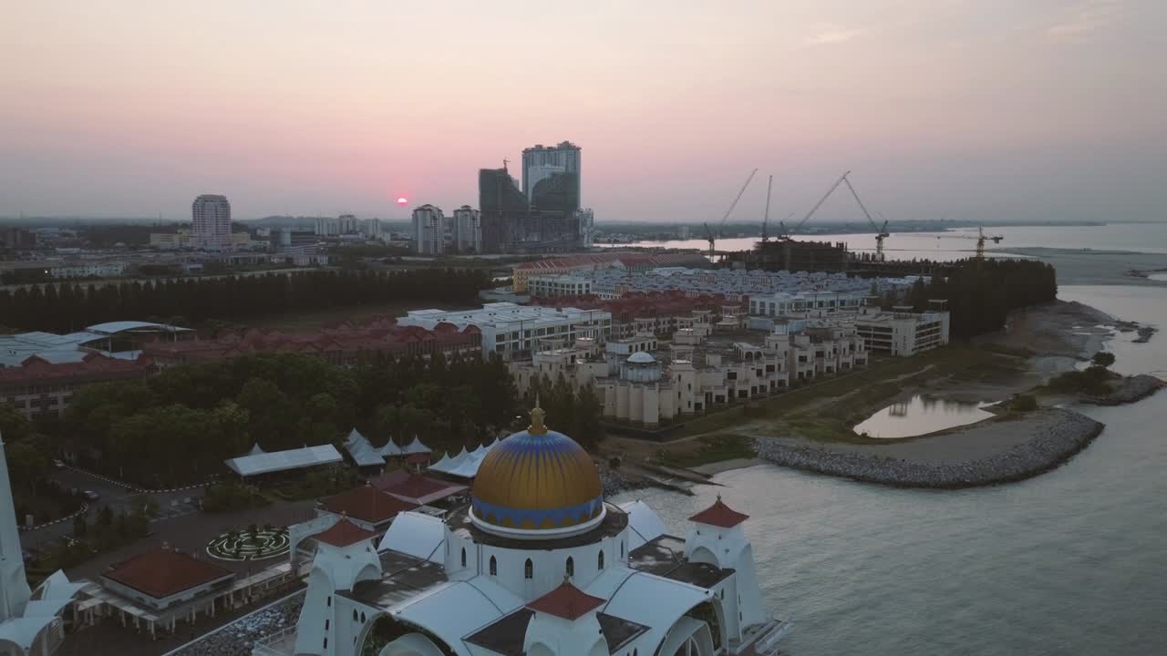 Aerial Footage - Sunrise at a mosque, The Melaka Straits Mosque,