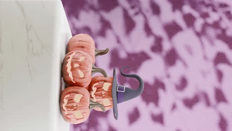 halloween pumpkins with witch hat casting shadows on pink background vertical