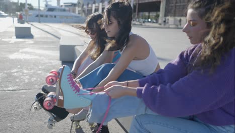 friends getting ready for roller skating at the port