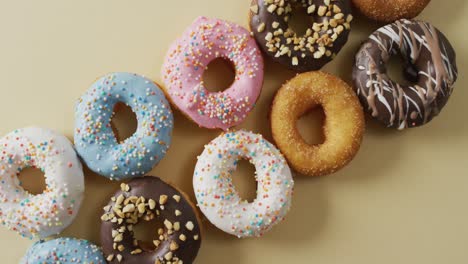 video of donuts with icing on white background