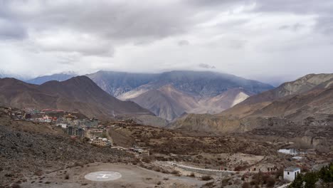 A-time-lapse-video-of-clouds-moving-over-the-rugged-Himalaya-Mountains-with-the-town-of-Muktinath-in-the-background