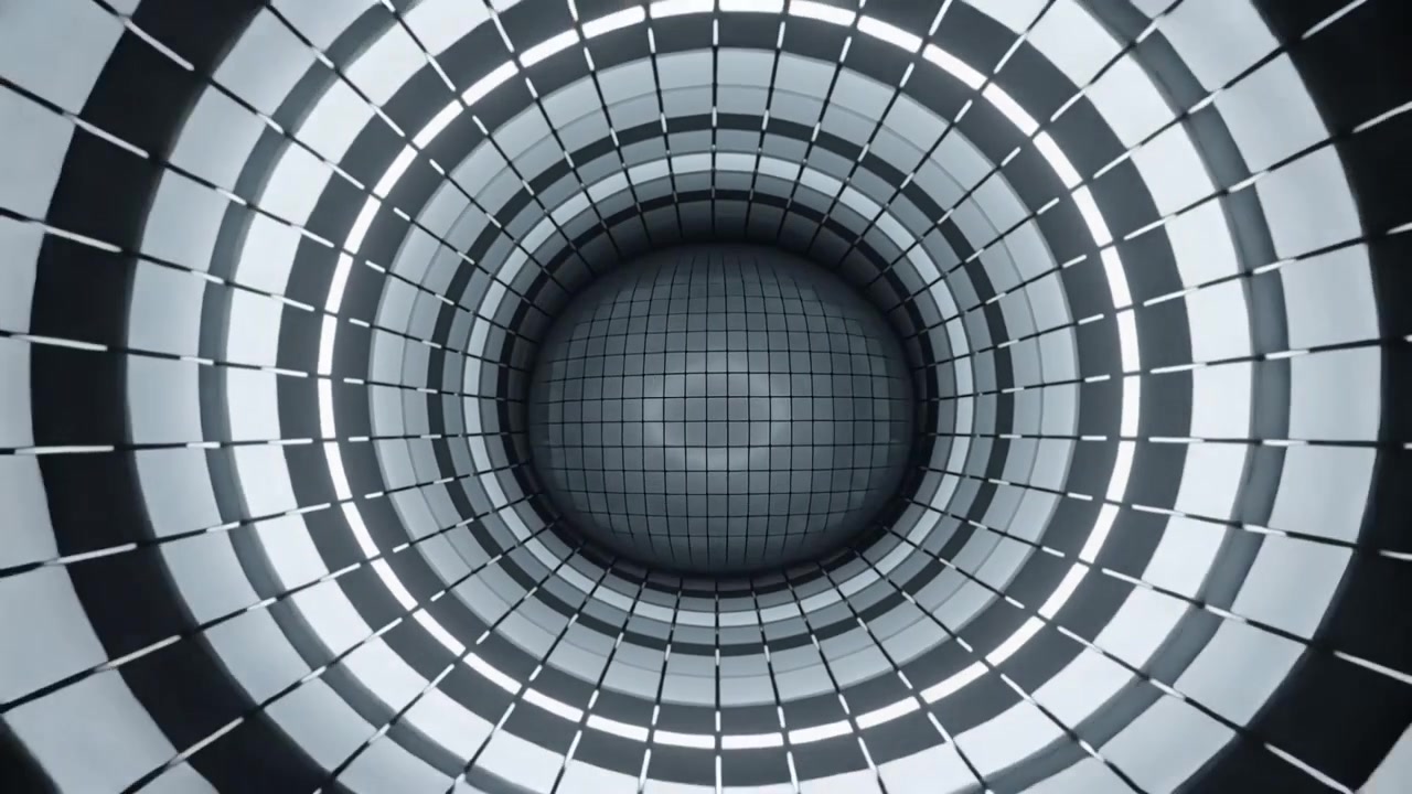 Telecamera che si allontana mostrando un tunnel metallico ad anelli, luci radiali e un nucleo piastrellato che si ritira verso un vuoto oscuro.