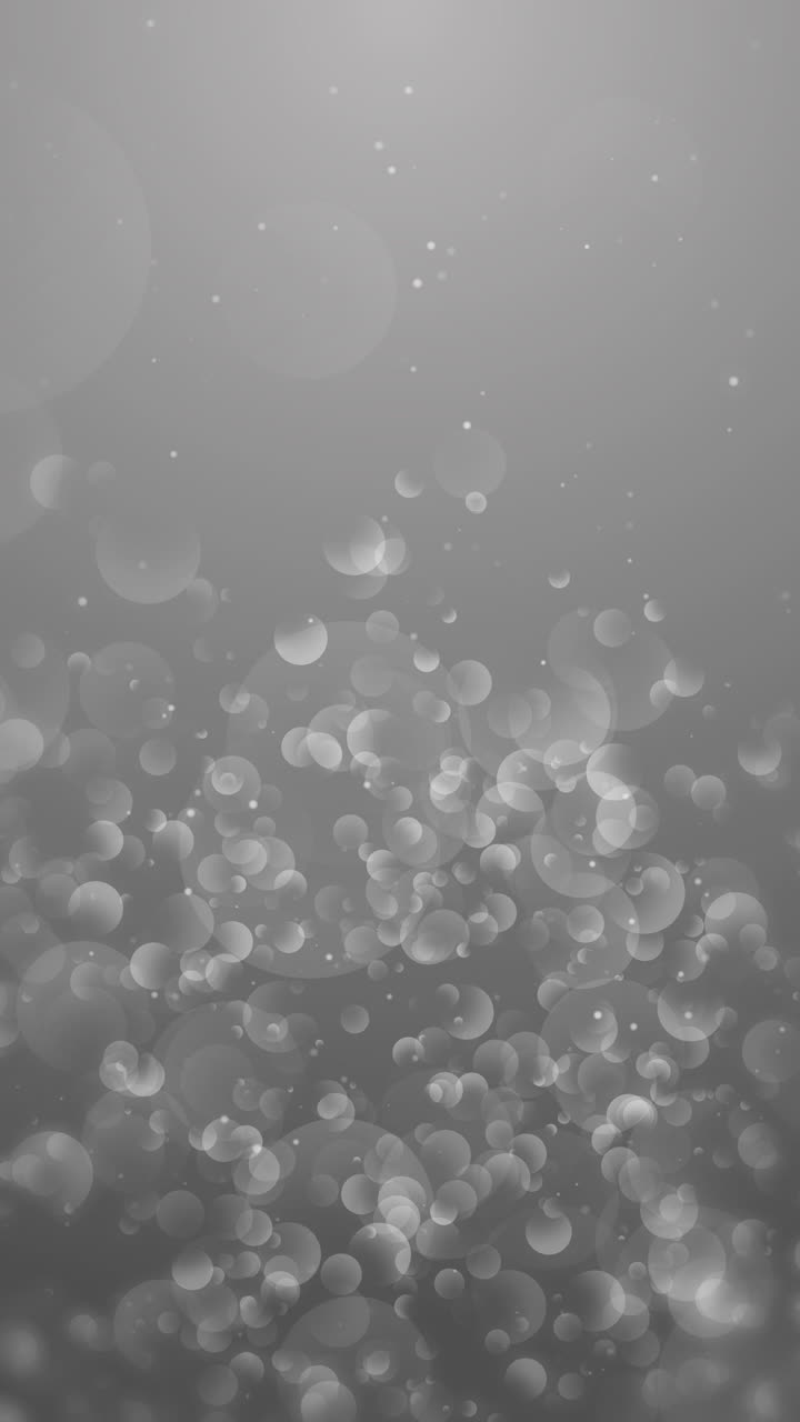 White dots and circle on a grey background pattern. Abstract geometric modern background. Art deco style. Circle loop animation. Vertical video.