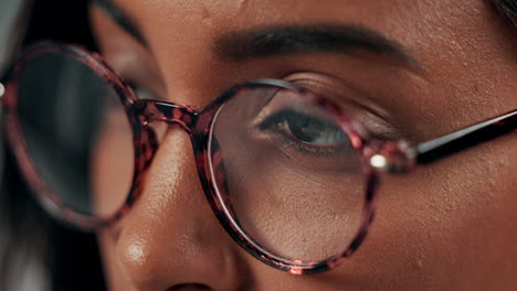 close-up portrait of a woman with glasses