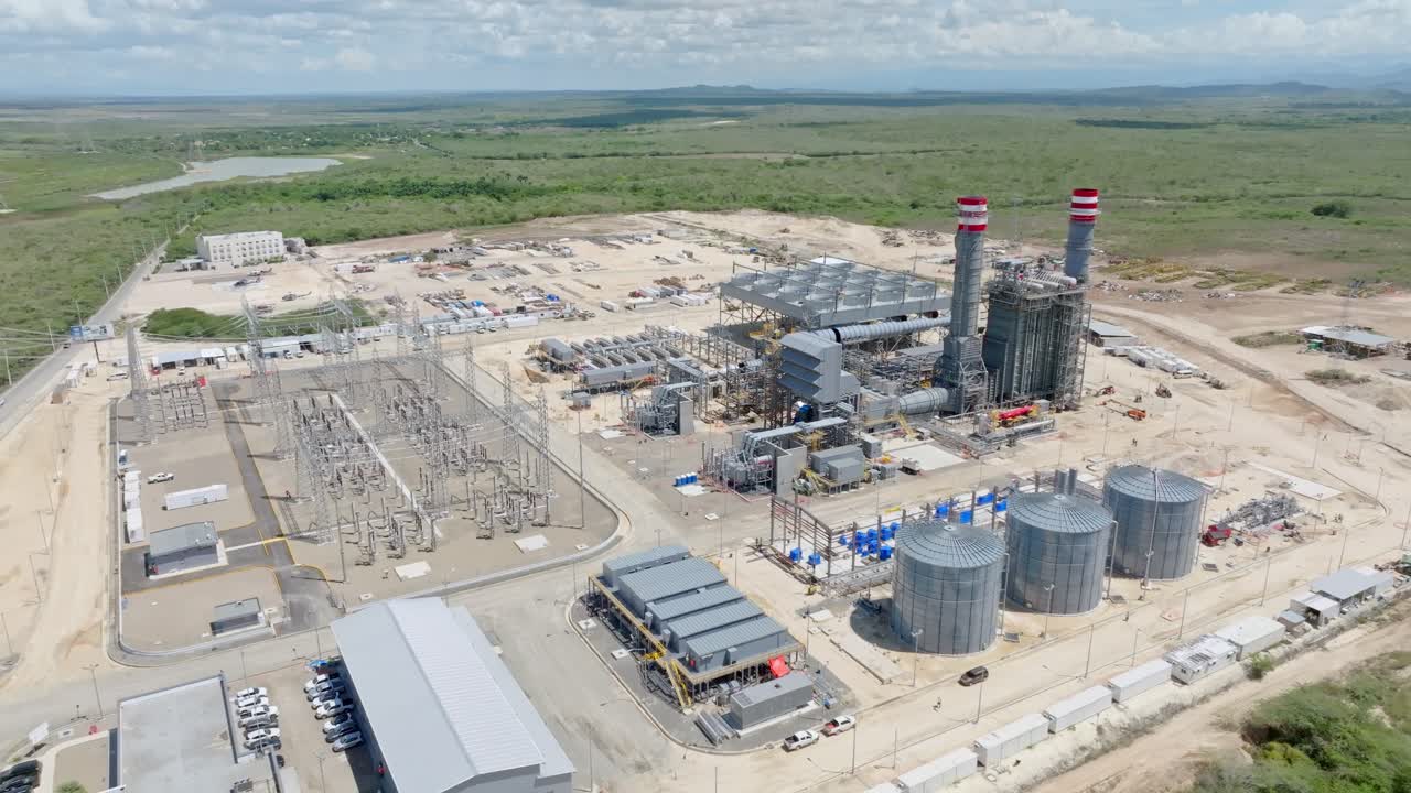 Power Plant Facility With A Substation And Storage Tanks Under Construction In Manzanillo, Dominican Republic. - aerial shot