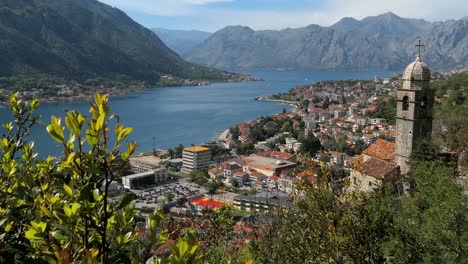 kotor bay, church of our lady of remedy, kotor town, cinematic shot, montenegro