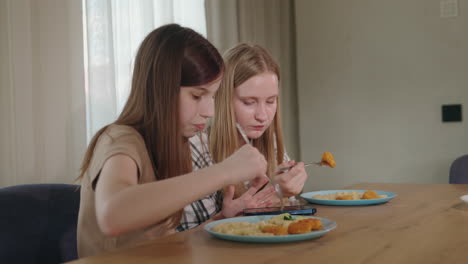 two girls having lunch together
