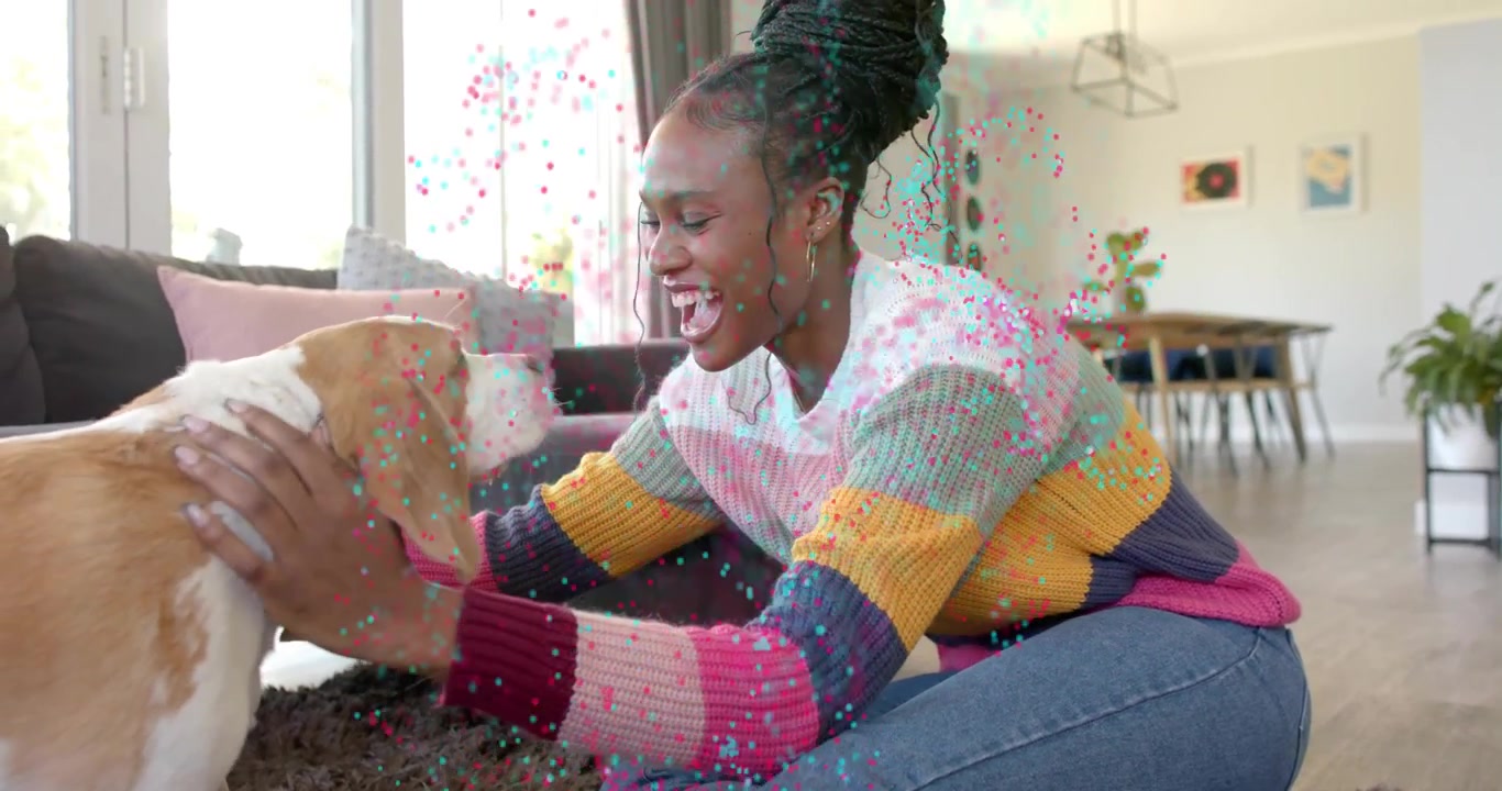 Woman leaning, petting dog on rug in living room, pink or teal particles spreading, boosting health