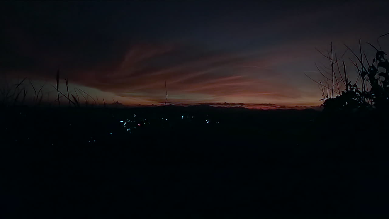 4k timelapse of a hilly countryside sunset with skyline in India.