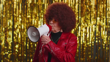 smiling stylish woman talking with megaphone, proclaiming news, loudly announcing sale advertisement