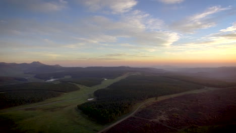 beautiful golden sunset in lush green rural hills 360 aerial panorama
