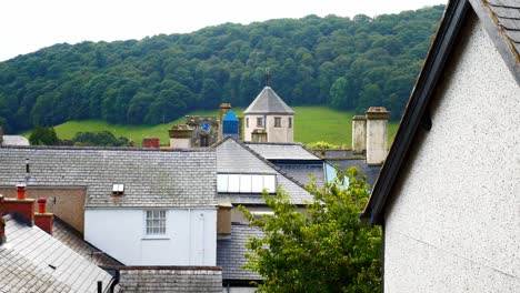 old watch tower building between medieval castle walls above small town conwy rooftops