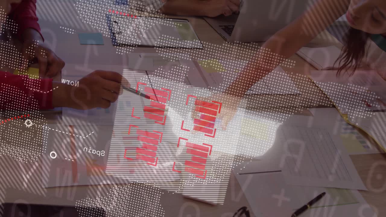 Colleagues lifting pen pointing at red bars displaying global map and data for business analysis