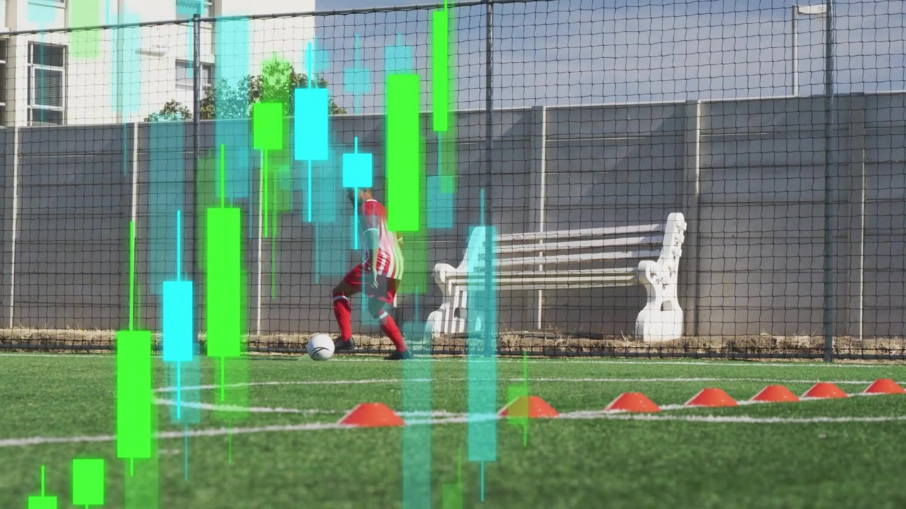 Male player starting touches on turf, training ball control near cones while cyan bars overlaying