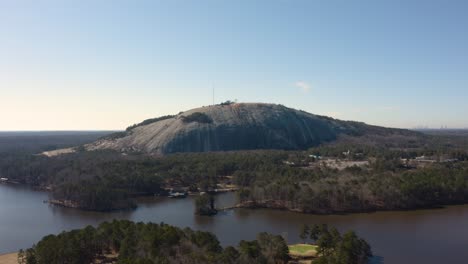 Aerial-drone-shot-slowly-rotating-clockwise-around-the-NE-side-of-Stone-Mountain-near-Atlanta,-Georgia