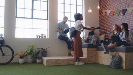 young-multi-ethnic-business-students-brainstorming-team-leader-woman-sharing-corporate-documents-to-colleagues-working-together-in-modern-office-workplace