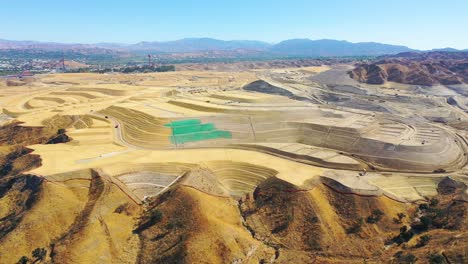 aerial over a massive vast giant tract home contruction project development in the hills above santa clarita california suggests los angeles urban sprawl 5