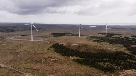 Drone-shot-of-three-wind-turbines-near-Stornoway-on-the-Isle-of-Lewis