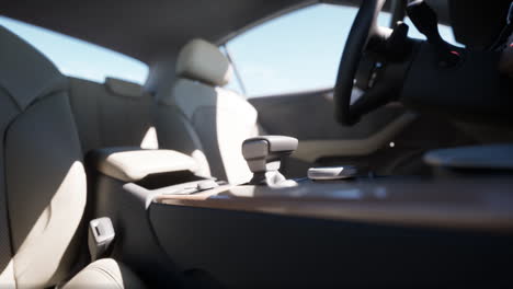 inside a modern car with leather seats and an automatic transmission