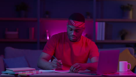 man studying late at night