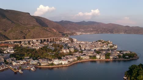 village and lake in shuanglang, yunnan, china.