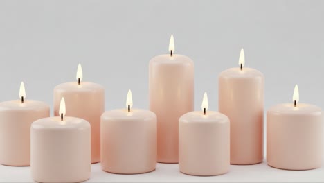 elegant display of soft pink candles with gentle flames illuminating a calm atmosphere, creating a serene and peaceful ambiance for relaxation and meditation