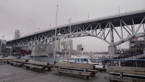 wide shot of granville island bridge and yaletown on cloudy day