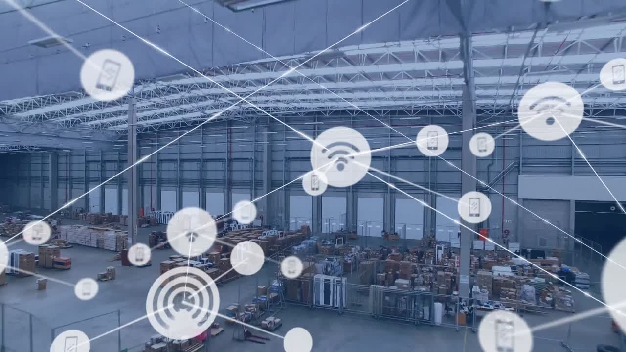 Animation of network of digital icons against aerial view of warehouse