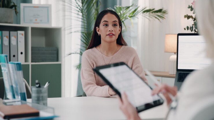 Happy Woman Smiling at a Business Meeting