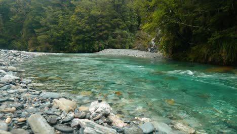 clear river unveils mesmerizing rock formations below
