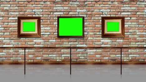 picture frames with green chromakey space hang on brick wall